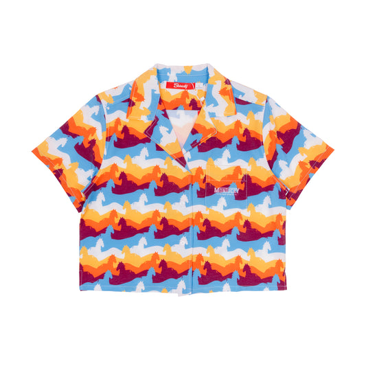 Colorful patterned shirt with a brand logo on a white background