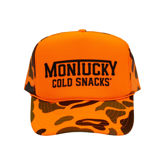 Orange and camouflage cap with 'Montucky Cold Snacks' text on a white background